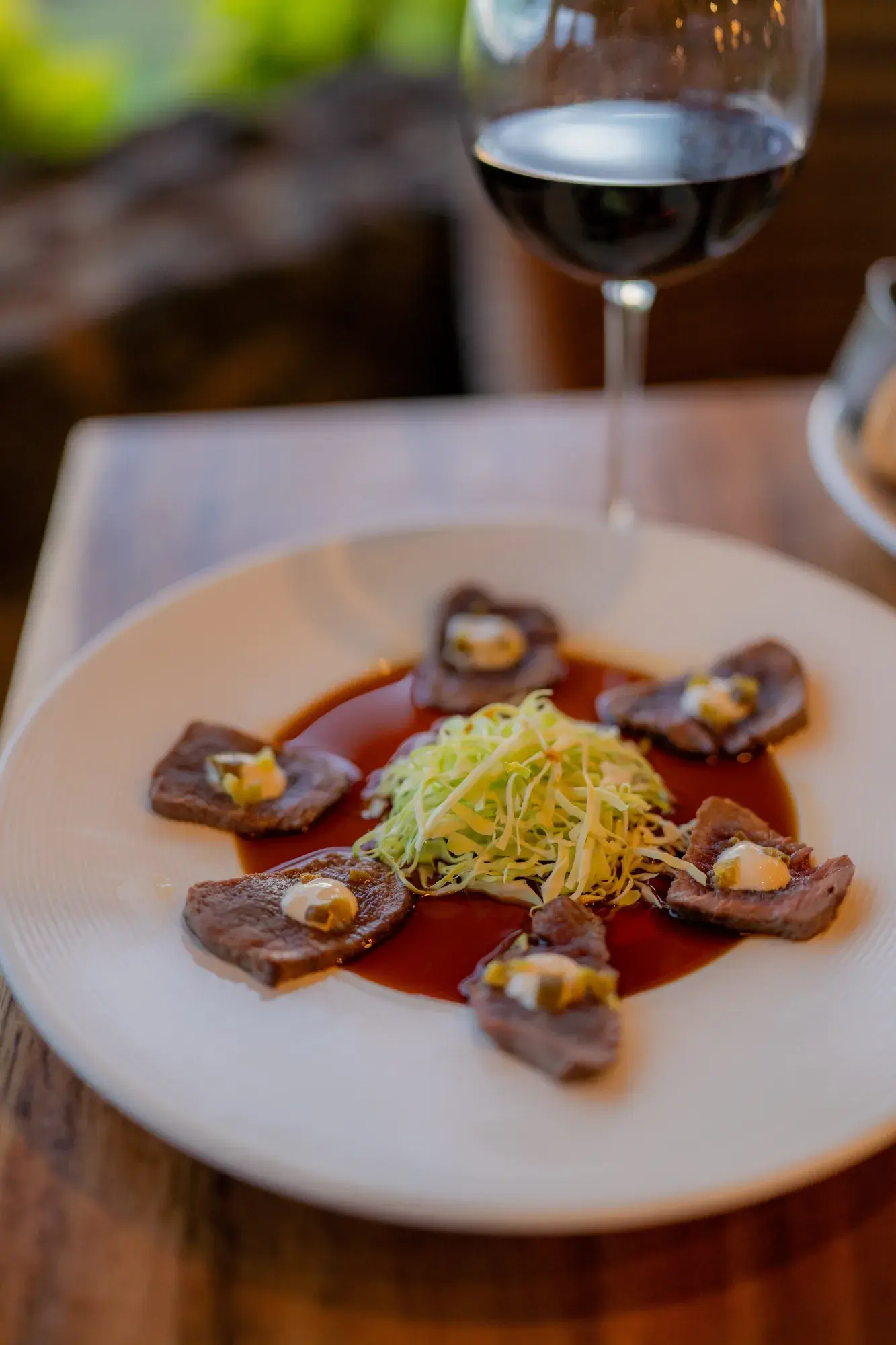 Beef Tataki at Kona Inn Restaurant, Yuzu aioli, green onion, jalapeño, house made smoked ponzu.