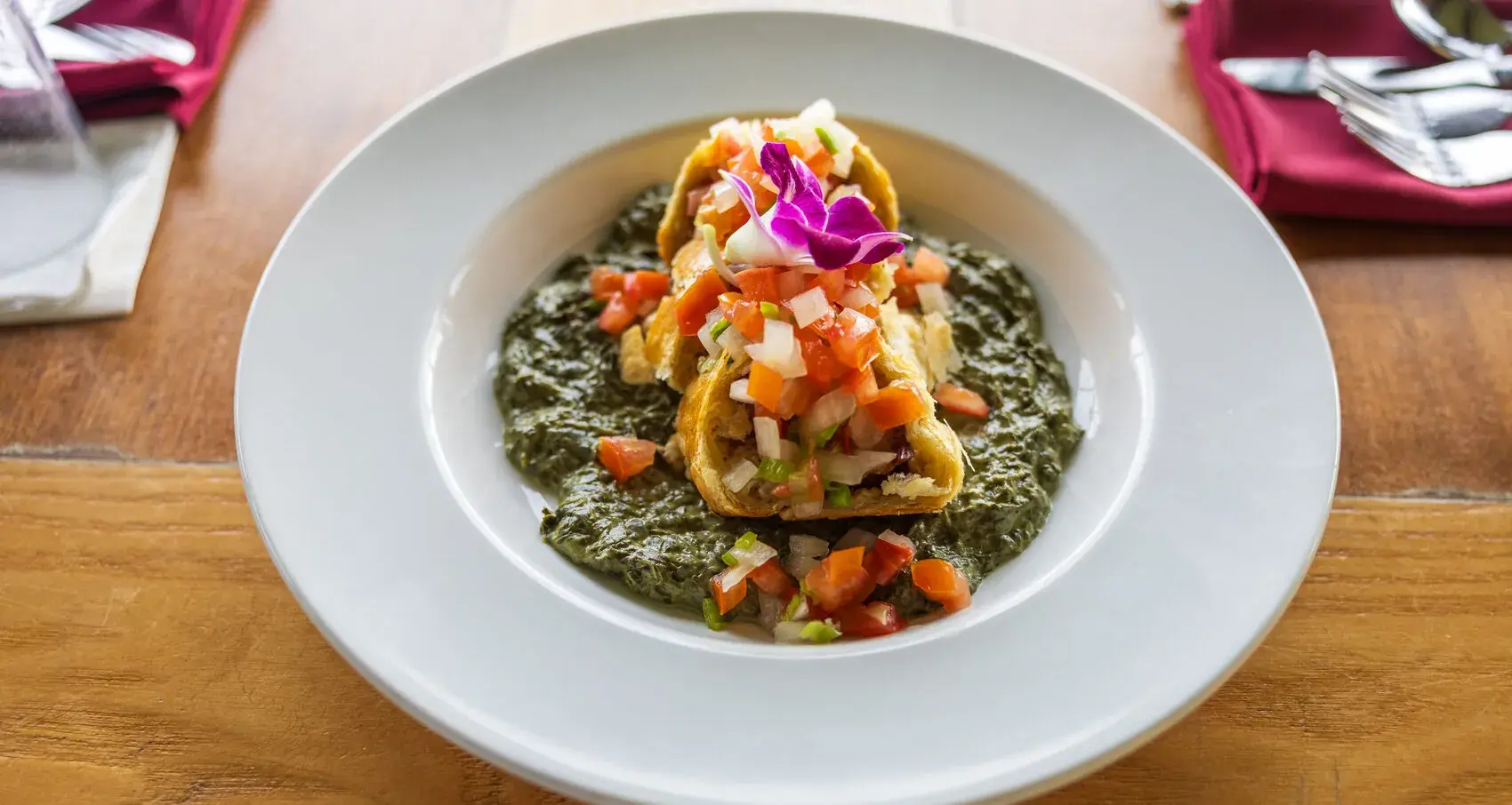 Fresh catch Fish Tacos at Kona Inn Restaurant with cabbage, pineapple relish and cilantro crema