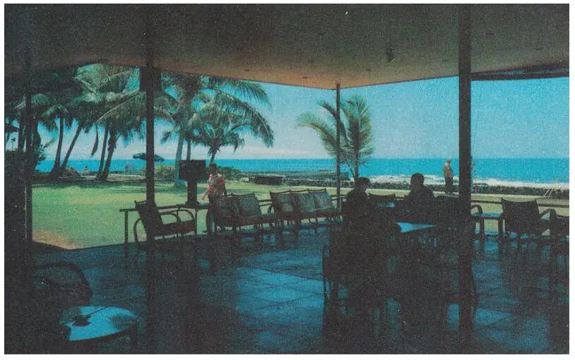 Vintage oceanfront dining room at the Kona Inn with open-air ocean views over Kailua Bay