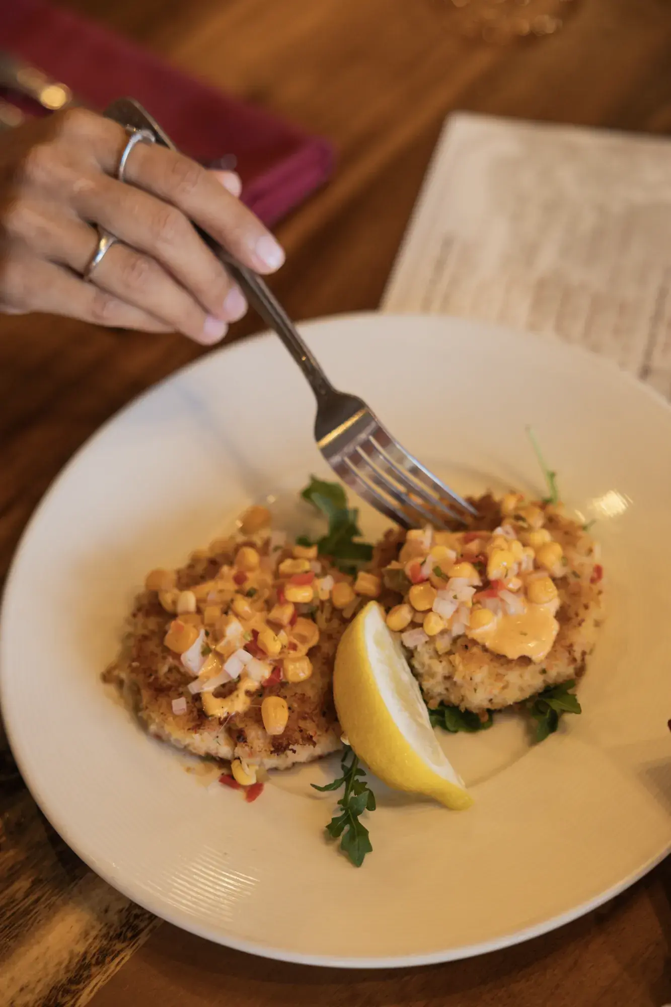 Shrimp and Crab Cakes at Kona Inn Restaurant, Roasted red pepper aioli, corn relish.